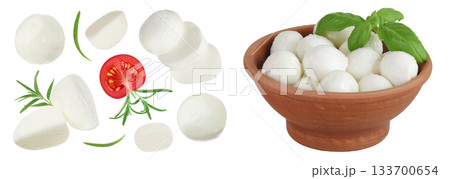 Mini mozzarella balls with rosemary and tomato in ceramic bowl isolated on white background. Top view. Flat lay. Mini mozzarella balls with rosemary and tomato in ceramic bowl isolated on white background. Top view. Flat lay. 133700654