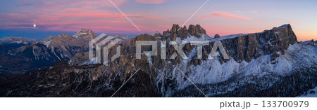 Panoramic view of Dolomite mountain peaks in beautiful morning light. Early winter scene with snow-covered summits, captured in high resolution. perfect for large fine art prints. 133700979