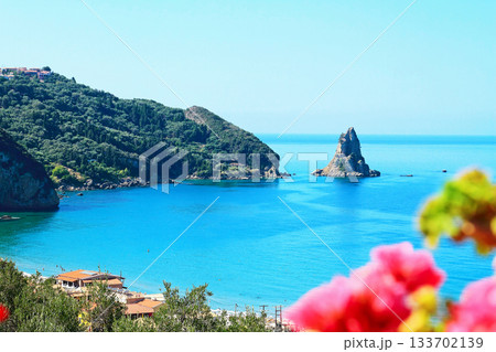 View of the picturesque Bay of Agios Gordios from above. Corfu island, Greece. View of the picturesque Bay of Agios Gordios from above. Corfu island, Greece. 133702139