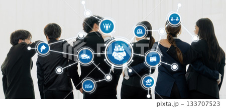 Business Team Cooperation with Technology Connections and Collaboration Symbols for Networking and Partnership Concepts. Amity Business Team Cooperation with Technology Connections and Collaboration Symbols for Networking and Partnership Concepts. Amity 133707523