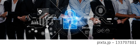 Business Team Members in Collaboration with Digital Security Symbols Representing Network Protection and Collaboration for Modern Enterprises Trope Business Team Members in Collaboration with Digital Security Symbols Representing Network Protection and Collaboration for Modern Enterprises Trope 133707881