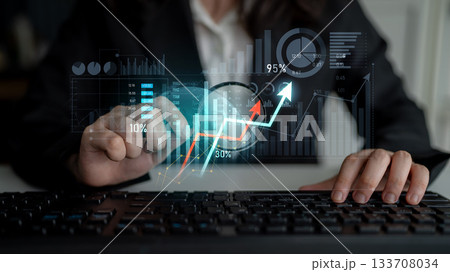 Business professional analyzing data with digital graphs and statistics on keyboard, showcasing growth and performance metrics in modern workplace environment Scalp Business professional analyzing data with digital graphs and statistics on keyboard, showcasing growth and performance metrics in modern workplace environment Scalp 133708034