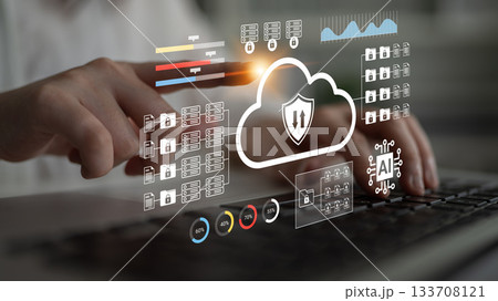Modern Data Security Concept with Cloud Technology Represented by Digital Graphic Overlay During Laptop Usage in a Professional Setting Gantry 133708121