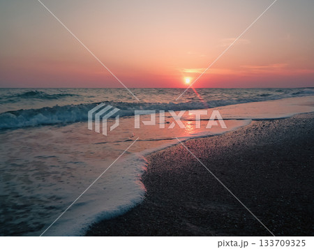 Golden Sunset Over Silhouetted Landscape 133709325