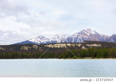 Scenic view to cyan cold waters of the mountain lake. 133710507