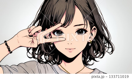 笑顔でピースサインを見せる若い女性