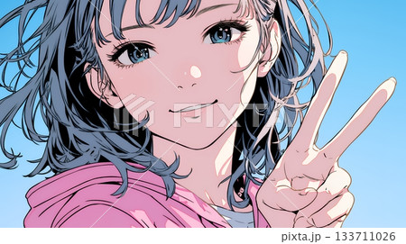 笑顔でピースサインを見せる若い女性