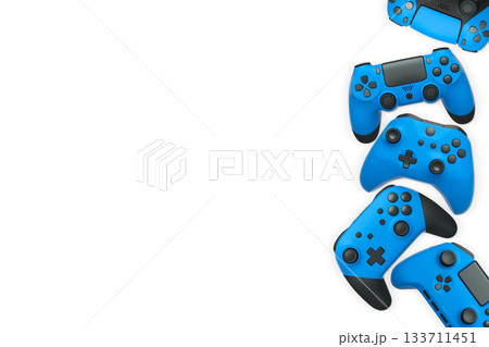 Wireless gaming controllers flying in air isolated on white background, symbolizing gaming technology concept Wireless gaming controllers flying in air isolated on white background, symbolizing gaming technology concept 133711451