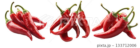 Fresh red chili peppers tied with string, isolated on a white transparent background. Spicy food and cooking ingredient concept Fresh red chili peppers tied with string, isolated on a white transparent background. Spicy food and cooking ingredient concept 133712006