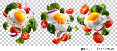 Fried egg, broccoli florets, cherry tomatoes, and onion rings floating mid-air, isolated on white transparent background 133712039
