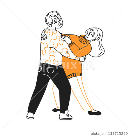 Playful Couple Dancing Together in Joyful Embrace 133715299