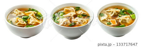 Steamed Dumplings served in hot Wonton Soup garnished with cilantro and scallions, isolated on white background Steamed Dumplings served in hot Wonton Soup garnished with cilantro and scallions, isolated on white background 133717647