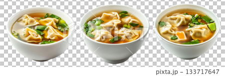 Steamed Dumplings served in hot Wonton Soup garnished with cilantro and scallions, isolated on white background Steamed Dumplings served in hot Wonton Soup garnished with cilantro and scallions, isolated on white background 133717647