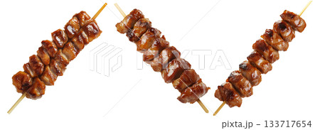 Grilled chicken yakitori skewer with teriyaki glaze or Isaw Filipino street food isolated on white transparent background Grilled chicken yakitori skewer with teriyaki glaze or Isaw Filipino street food isolated on white transparent background 133717654