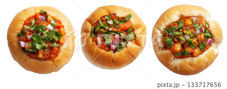 Indian Vada pav bread stuffed with spicy vegetable curry, garnished with onions and herbs, isolated on white background 133717656