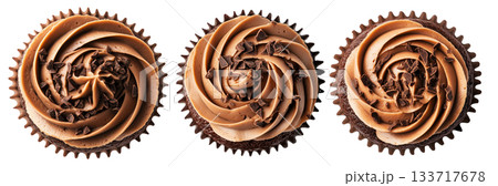 Chocolate cupcake topped with creamy swirled frosting and chocolate shavings, isolated on white background 133717678