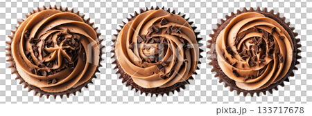 Chocolate cupcake topped with creamy swirled frosting and chocolate shavings, isolated on white background 133717678