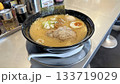 飲食店の風景（チェーン店の味玉味噌ラーメン） 133719029