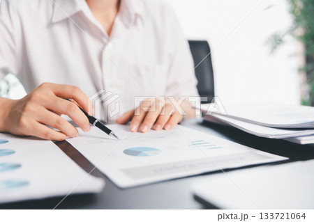 Business woman analyze calculate company financial, tax results office accounting statistics analytical research. calculating business balance prepare tax reduction. Tax deduction planning concept. Business woman analyze calculate company financial, tax results office accounting statistics analytical research. calculating business balance prepare tax reduction. Tax deduction planning concept. 133721064