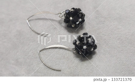 Handcrafted earrings made of beads and glass beads. Silver and gold hardware. 133721370