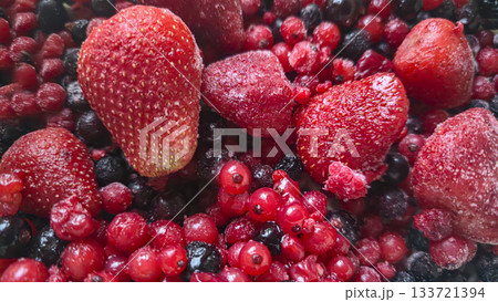 Frozen fruit. Fruit mix of currants and strawberries. Preserves for the winter. 133721394