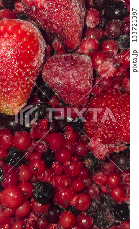 Frozen fruit. Fruit mix of currants and strawberries. Preserves for the winter. 133721397