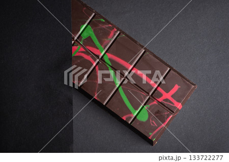 Colorful Chocolate Bar with Artistic Swirls and Bright Patterns 133722277