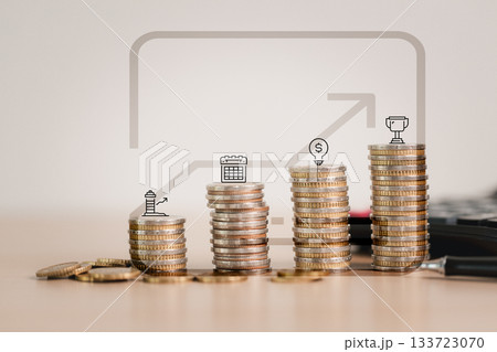 Stacks of coins arranged in rising steps with goal icons and an upward arrow, symbolizing financial planning, savings growth, investment strategy, long-term goals and successful money management. Stacks of coins arranged in rising steps with goal icons and an upward arrow, symbolizing financial planning, savings growth, investment strategy, long-term goals and successful money management. 133723070