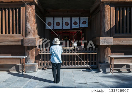 Japanese woman sacred Hakozaki Shrine main hall, Fukuoka Japanese woman sacred Hakozaki Shrine main hall, Fukuoka 133726907