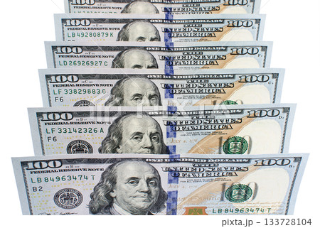 Banknotes of one hundred dollars in a row close up Banknotes of one hundred dollars in a row close up 133728104