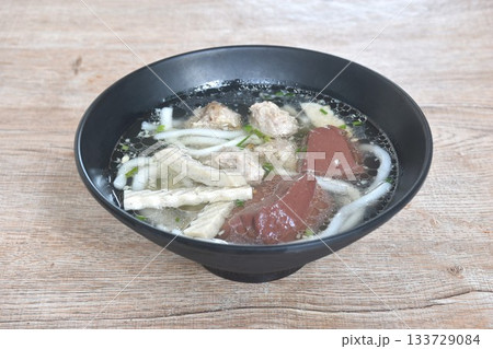 Vietnamese rice noodles or Pho with slice sausage and chop pork couple blood in soup on bowl Vietnamese rice noodles or Pho with slice sausage and chop pork couple blood in soup on bowl 133729084
