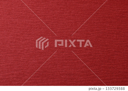和風デザインに使える赤い和紙テクスチャ 133729388