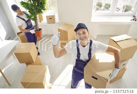 Smiling Mover Portrait with Thumbs Up during Office or Home Relocation 133732518