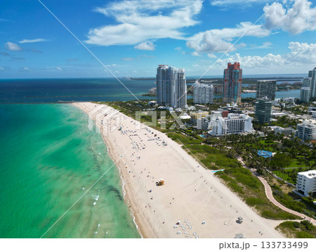Coastline of Miami. Miami south beach aerial view. Sea beach seashore and coastline. Summer vacation in Miami, Florida. Sea vacation on beach. Aerial marina view. Turquoise waters 133733499