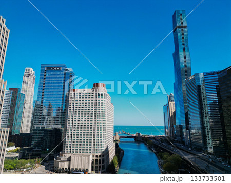 Chicago, USA - October 08, 2024: Downtown architecture. Skyscraper architecture of city. Cityscape. Chicago downtown cityscape at Chicago river. Cityscape with skyscraper building. Magnificent Mile 133733501