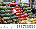 Seasonal Egyptian mango, pomegranate on market. Green mango, red pomegranate in boxes. Many green mangoes. Big mango. Mango season in Egypt. 133733534