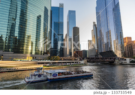 Chicago, Illinois, USA - October 21, 2024: Chicago city travel. Skyscraper building at business district. Skyscraper of Chicago downtown. Cityscape view with water taxi. City boat tour Chicago, Illinois, USA - October 21, 2024: Chicago city travel. Skyscraper building at business district. Skyscraper of Chicago downtown. Cityscape view with water taxi. City boat tour 133733549