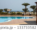 View of the swimming pool in the Grande Sharm Resort and Spa located which one of Egypt beautiful Red Sea Riviera. Travel destinations. 133733582