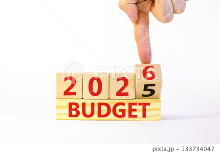 2026 Budget symbol. Concept words 2026 Budget on beautiful wooden blocks. Beautiful white paper background. Businessman's hand. Business and 2026 budget concept. Copy space. 133734047
