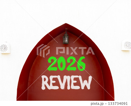 2026 Review symbol. Concept words 2026 Review on beautiful white and red wall. Beautiful white and red wall background. Business and 2026 review concept. Copy space. 2026 Review symbol. Concept words 2026 Review on beautiful white and red wall. Beautiful white and red wall background. Business and 2026 review concept. Copy space. 133734091