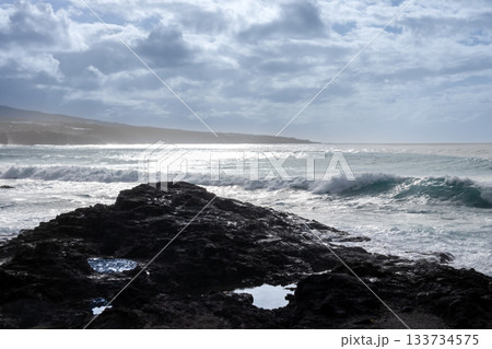 Rocky coast and Atlantic ocean, Tenerife, Spain 133734575