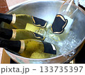 Champagne Bottles Chilled In Ice Bucket With Gold And Black Labels For Celebration, Luxury Lifestyle 133735397