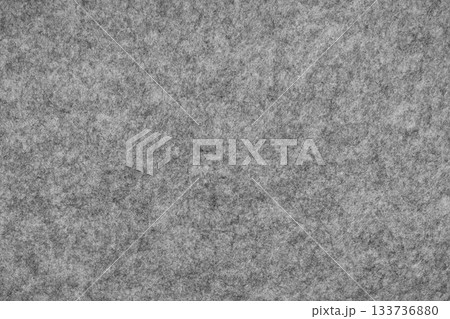 Gray felt background - close-up of a soft fabric surface. Seamless background, graphic design, scrapbooking, textile layouts, creative projects. 133736880