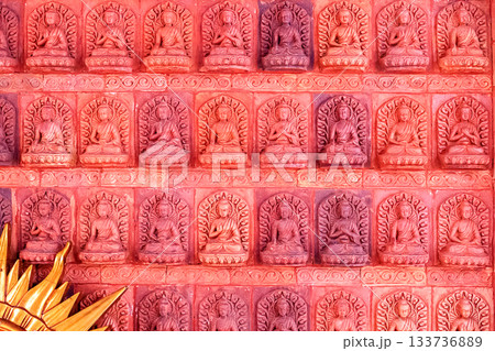 A bas-relief with multiple Buddha figures in Nanshan Park, Sanya, Hainan. A bas-relief with multiple Buddha figures in Nanshan Park, Sanya, Hainan. 133736889