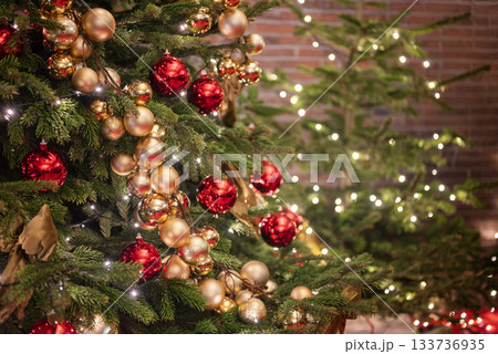Banner of a decorated Christmas and New Year's tree with decorations and bokeh Banner of a decorated Christmas and New Year's tree with decorations and bokeh 133736935