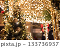 Banner of a decorated Christmas and New Year's tree with decorations and bokeh with snow on the branches 133736937