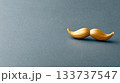 Golden Mustache Decoration on Minimalistic Gray Background 133737547