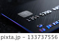 Macro Close-Up of Black Credit Card with Metallic Numbers and Chip for Finance Concepts 133737556