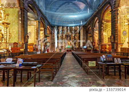 Prades, France - Sep 25, 2025: Interior of historic Saint Pierre church in Prades in Languedoc-Roussillon, France. Prades, France - Sep 25, 2025: Interior of historic Saint Pierre church in Prades in Languedoc-Roussillon, France. 133739014