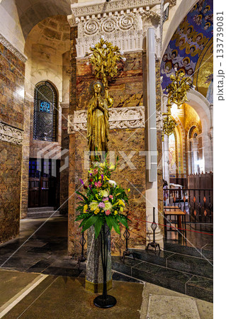 Interior of the Basilica in the Sanctuary of Lourdes, France. 133739081